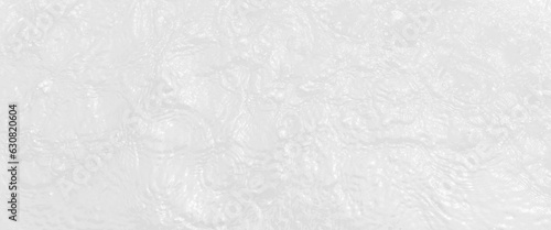 white wave abstract or rippled water texture background, white water with ripples on the surface, water waves with shining pattern texture background.