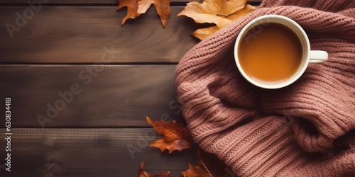 Autumn composition with leaves and a Cup of tea on a wooden background. The concept of autumn, knit sweaters, scarves, perfect for chilly autumn days, generative ai