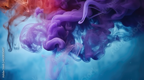 Colorful rainbow paint drops from above mixing in water, Ink swirling underwater, Abstract background.