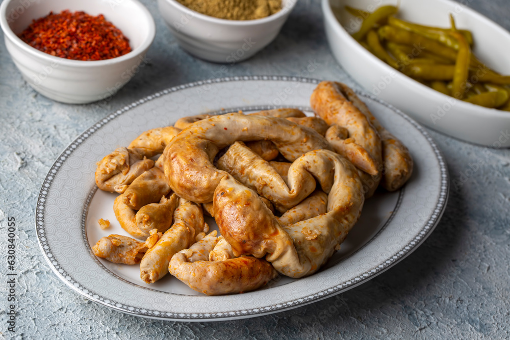Traditional delicious Turkish cuisine, Middle Eastern dishes, offal dishes, stuffed sheep intestines (Turkish name; Mumbar dolmasi) Traditional delicious Turkish cuisine, Middle Eastern dishes, offal dishes, stuffed sheep intestines (Turkish name; Mumbar dolmasi)