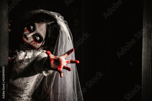 Fotografiet Halloween festival concept,Asian woman makeup ghost face,Bride zombie charactor,