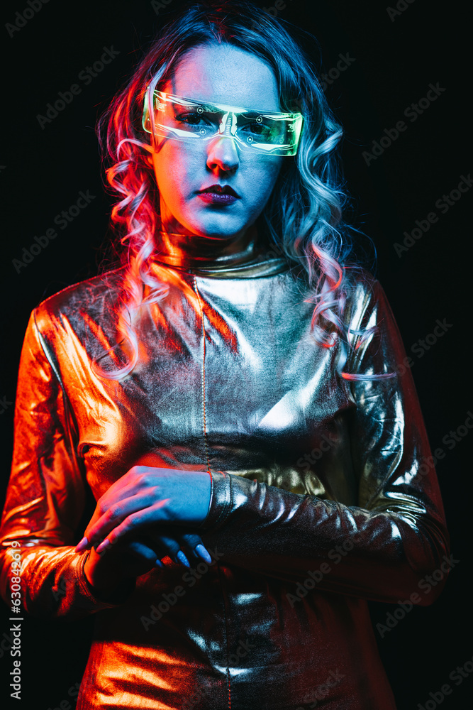 Cybernetic young girl against dark background Cybernetic young girl against dark background