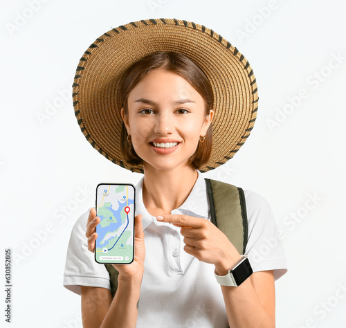Female tourist with mobile ...