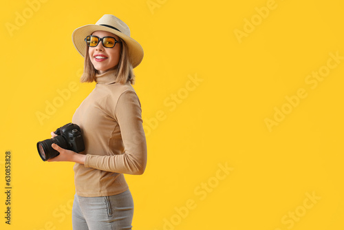 Female photographer with pr...