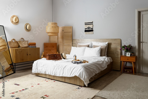 Interior of light bedroom w...