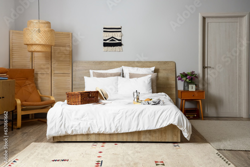 Interior of light bedroom w...
