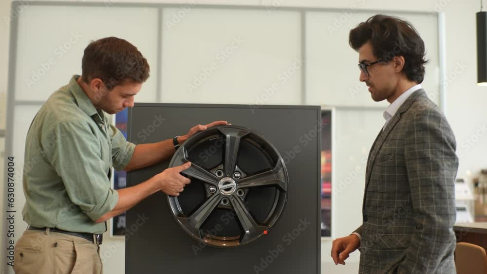 Front view of professional salesman in business suit talking about