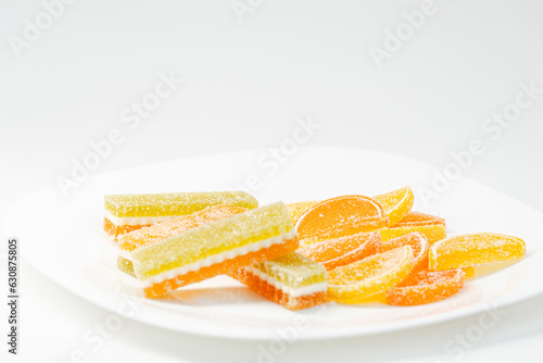 Foto Marmalade in sugar in a plate, isolated.