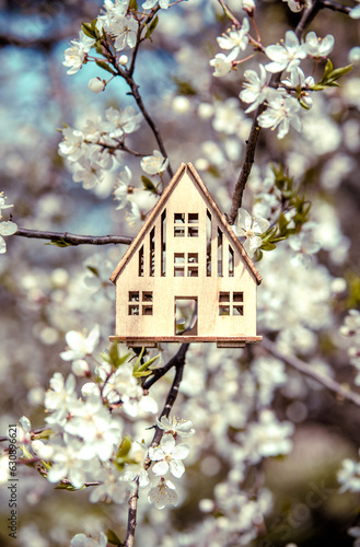 symbol of the house among the white cherry blossoms
