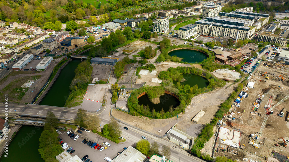Fototapeta premium Aerial Drone view of The disused Bath gasworks site that has been vacant since 1971 and now forms part of the Bath Western Riverside development.