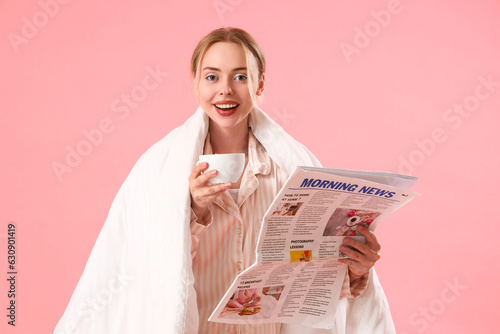 Young woman in pajamas with...