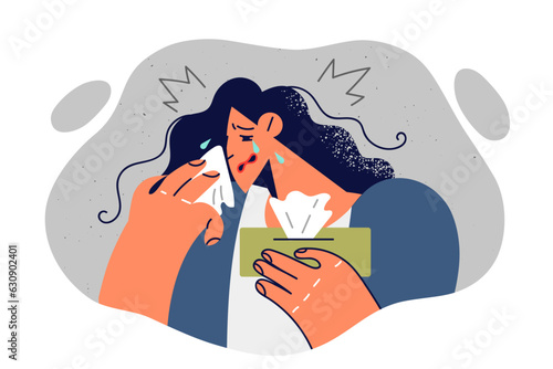 Crying woman wipes tears with paper towels and suffers after learning about incurable disease