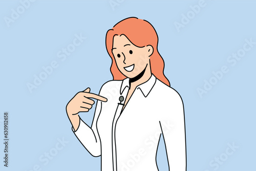 Woman with lavalier microphone on shirt smiles as she prepares for television interview. Girl with microphone for conducting business training and providing high-quality sound at corporate event