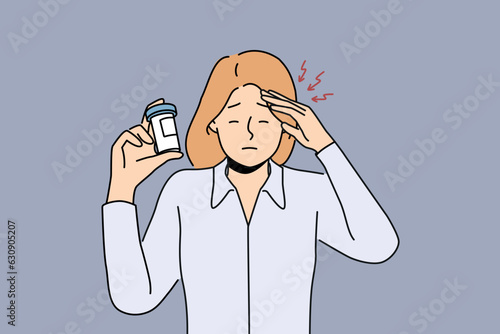 Woman suffers from headache and demonstrates package of medicines to cope with migraine. Girl with migraine or dizziness needs help of pharmacist and doctor due to termination of pills
