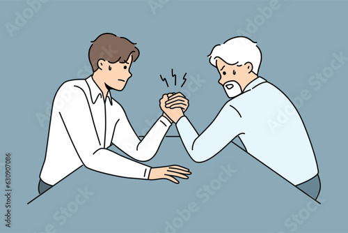 Competition of office workers of different ages doing arm wrestling to reveal strongest manager. Concept conflict between old and young employees of company and competition of experience against youth