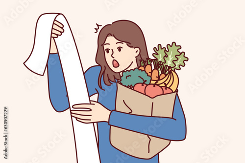 Shocked woman with cashier check and bag of groceries surprised by increase in prices due to inflation. Young girl opens mouth in resentment about food inflation that caused increase in spending.