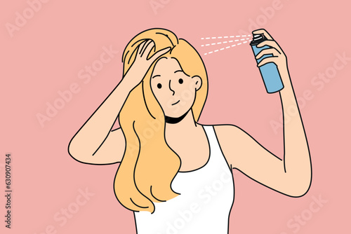 Woman puts hairspray on hair while preparing to go on date or party and wants to be most beautiful. Blonde girl uses cosmetic products for hair care, wanting to add splendor hairstyle