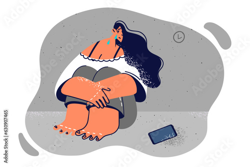 Woman cries sitting on floor near phone after talking with ex-boyfriend left for another girlfriend