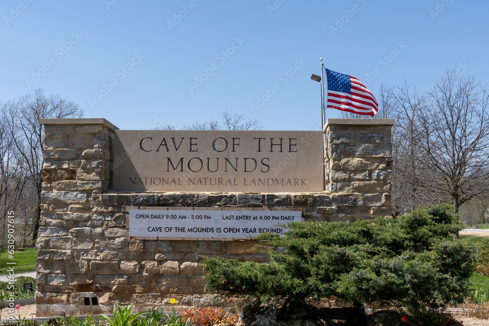 The sign of Cave of the Mounds, a National Natural Landmark is shown