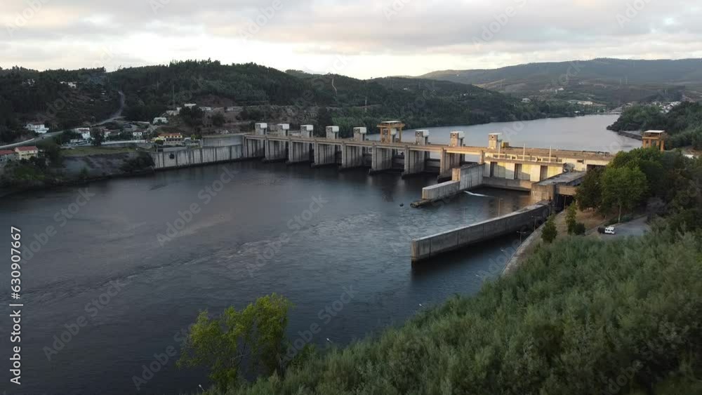 Aerial drone view over Crestuma dam in Douro River. Porto, Portugal, 2023. Aerial drone view over Crestuma dam in Douro River. Porto, Portugal, 2023.