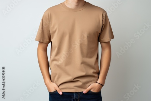 Young man in a beige T-shirt on white background, mock up 