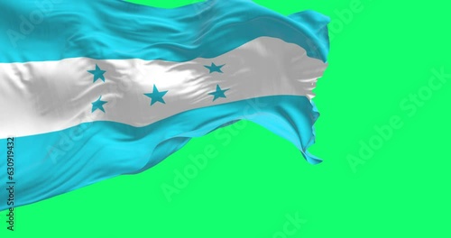 Flag of Honduras waving against a green screen photo