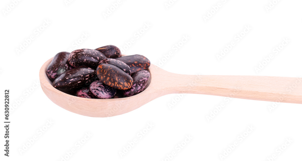 Wooden spoon with dry kidney beans isolated on white Wooden spoon with dry kidney beans isolated on white