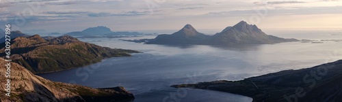 Panorama of Tomma island at dusk, in the northern Norwegian archipelago of Helgeland. Midnight twilight in the arctic. High megapixel. Sunset norwegian summer night, Smaltinden, Luröy, Nordnorge fjell