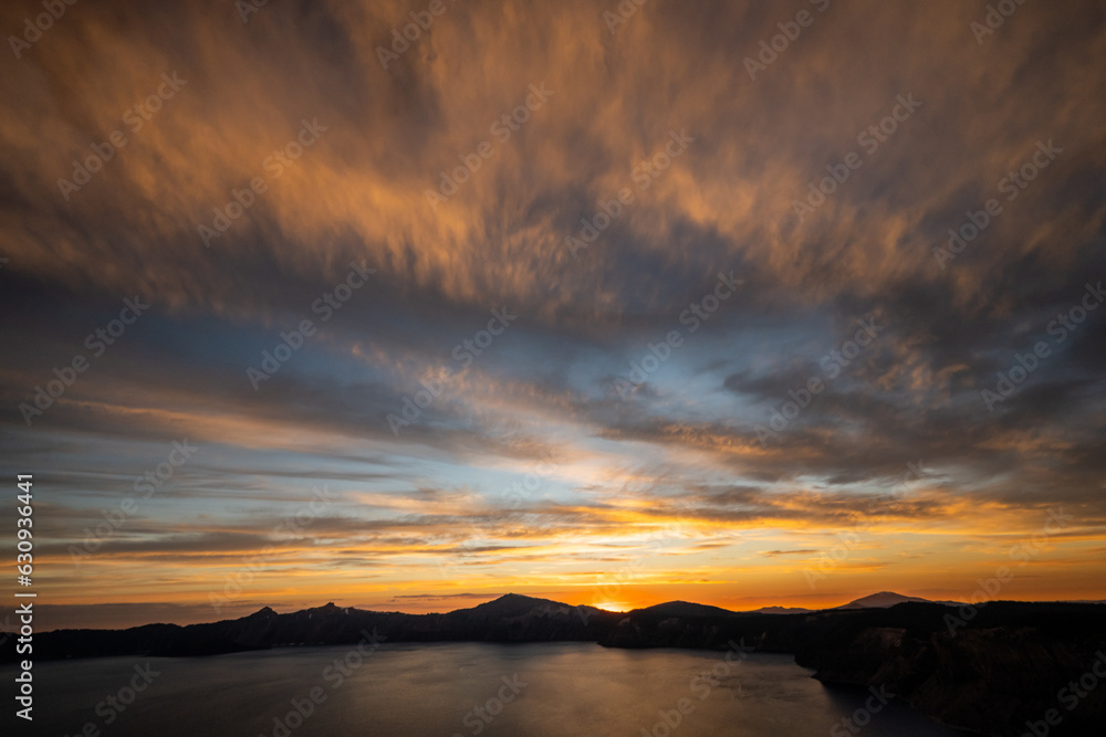 Dramatic Clouds Catch The Last Light At Sunset Over Crater Lake