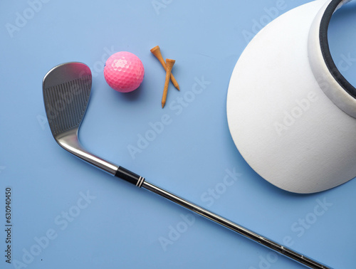 Tableau sur toile Flat lay of golf equipment on blue background - sport and hobby concept