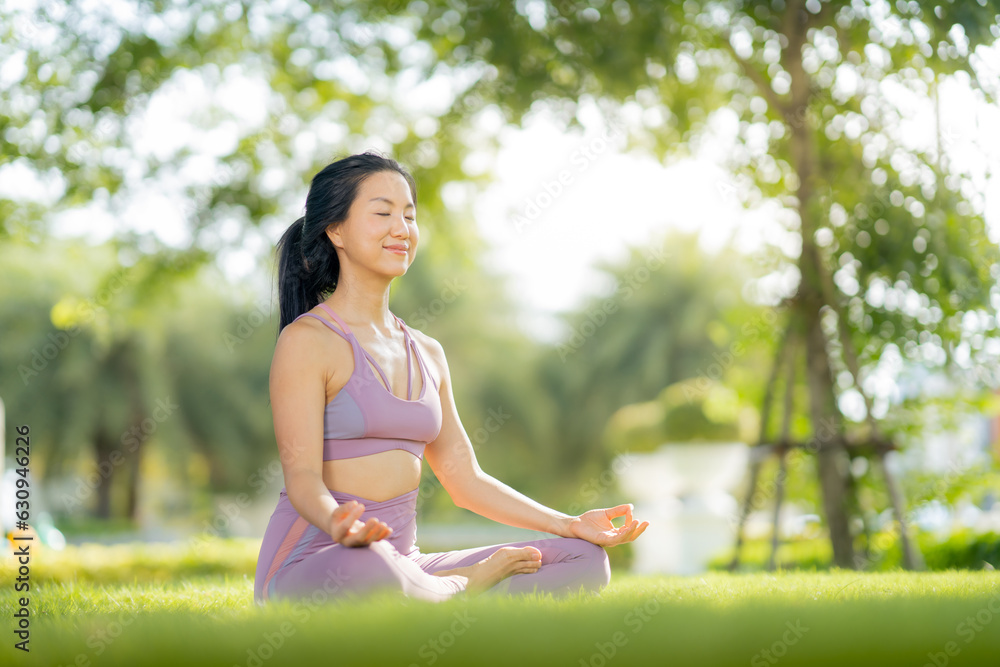 Asian woman wearing yoga clothes doing yoga at her village garden in the morning, happily, Sports healthy lifestyle concepts, Japanese concepts. Asian woman wearing yoga clothes doing yoga at her village garden in the morning, happily, Sports healthy lifestyle concepts, Japanese concepts.