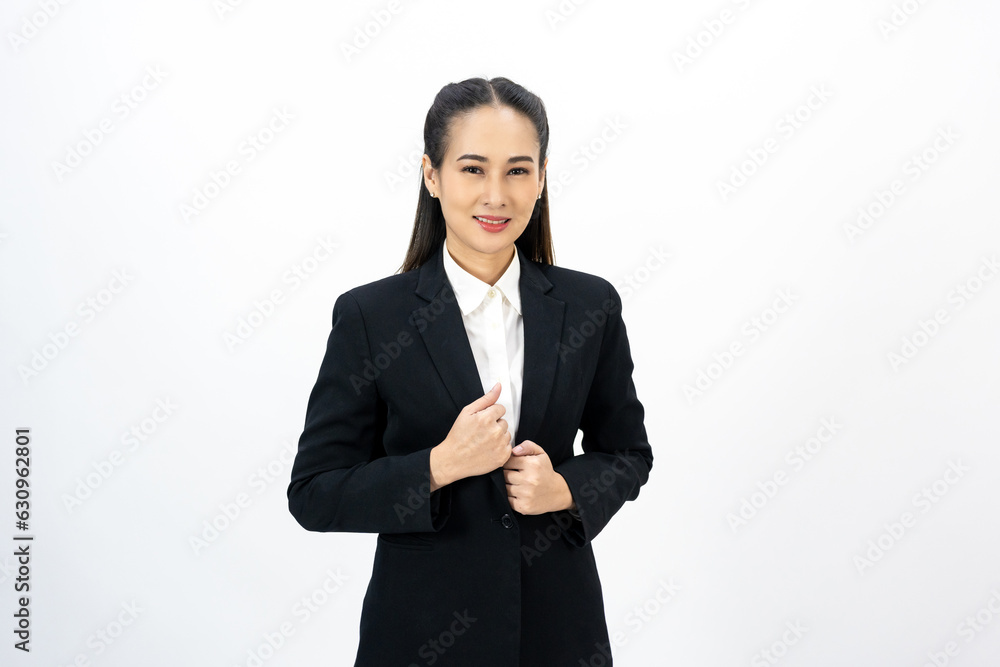 Young asian business woman happy smiling standing pose on isolated white background. Female around 25 in suit portrait shot in studio. Young asian business woman happy smiling standing pose on isolated white background. Female around 25 in suit portrait shot in studio.