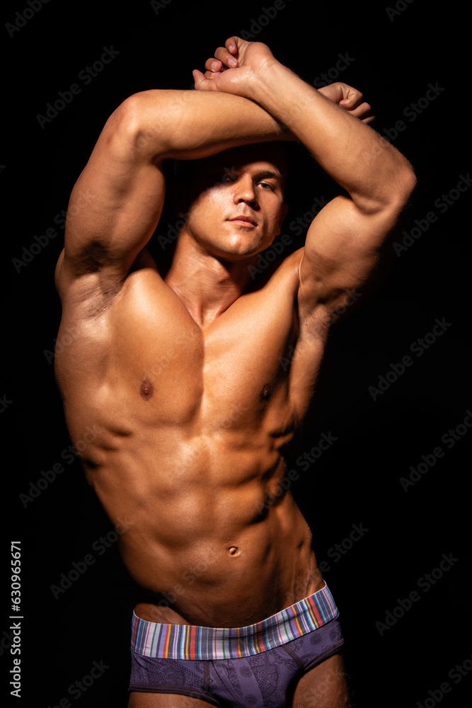 Fitness male model in studio