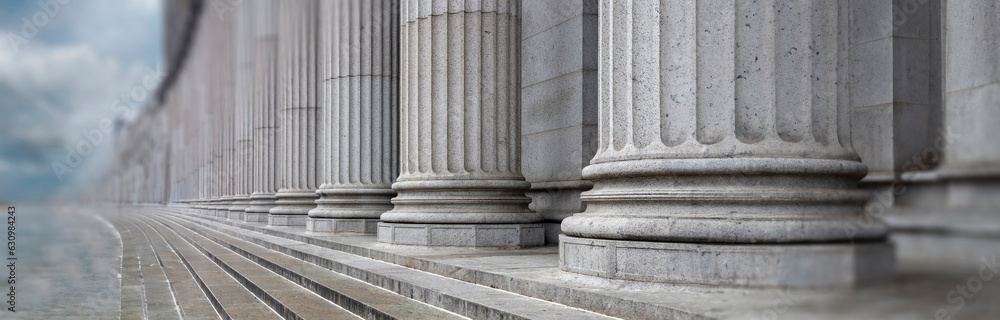Stone colonnade and stairs detail. Classical pillars row in a building facade