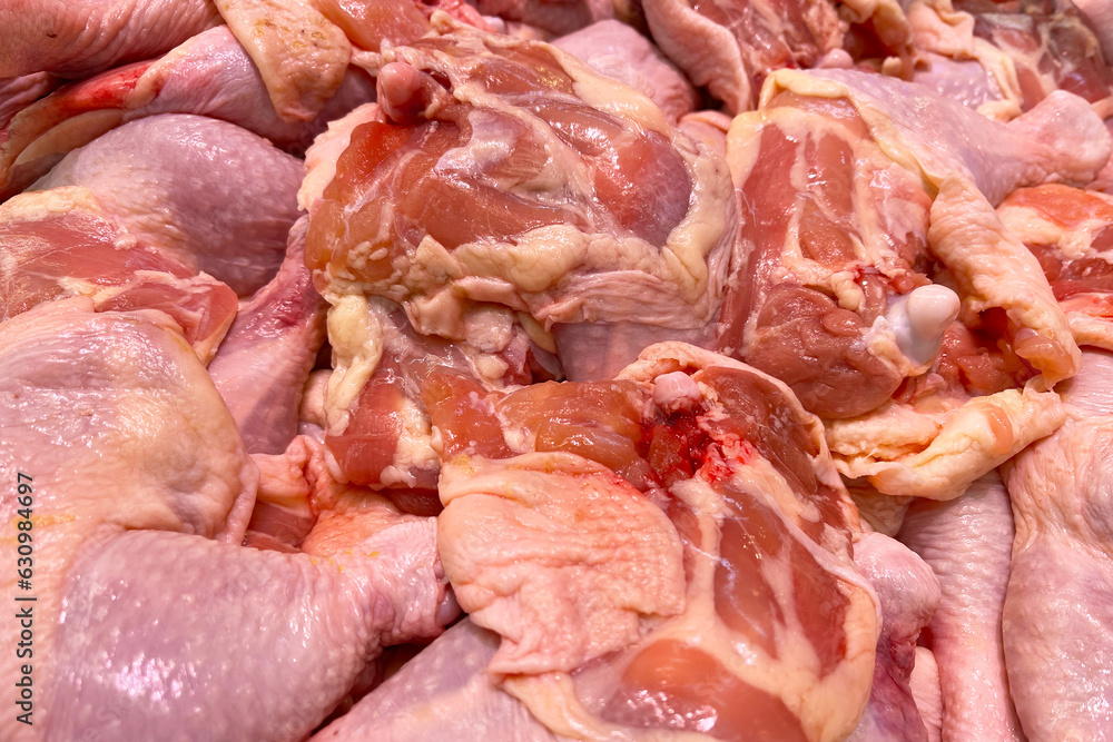 Uncooked chicken meat. Raw chicken thigh