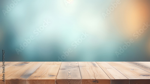 An empty wooden table on the edge of a blurred table background, in the style of light teal and light brown