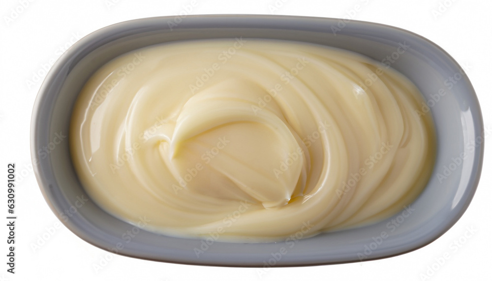 Bowl of condensed milk cream isolated on white background with clipping path, top view Bowl of condensed milk cream isolated on white background with clipping path, top view