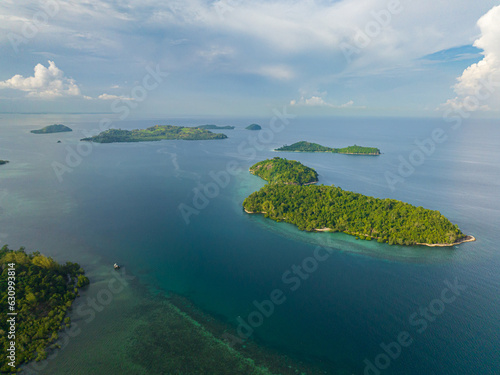 Islands surrounded by azure water and corals. Zamboanga City. Mindanao, Philippines. Seascape. Travel concept. © MARYGRACE