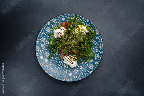 A delicious salad in a restaurant. Close-up