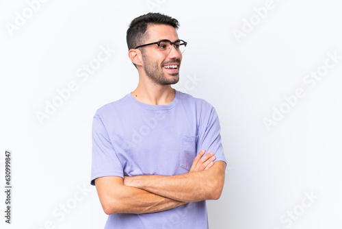 Young caucasian man isolated on white background happy and smiling