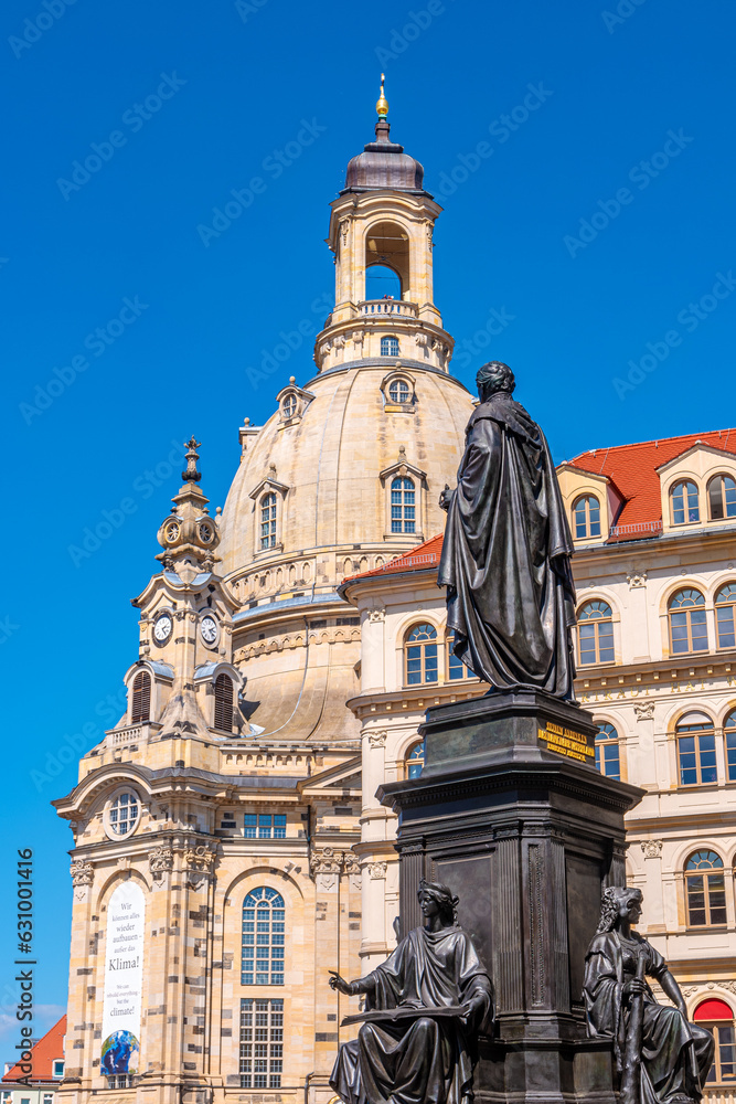 Dresden, Saxony, Germany - church of our Lady and Neumarkt square and Martin Luther monument in downtown of Dresden at sunny Spring day with blue sky