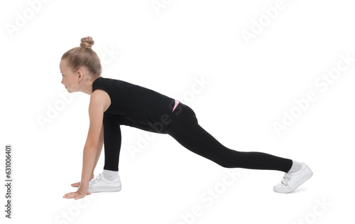 Little girl doing morning exercise on white background