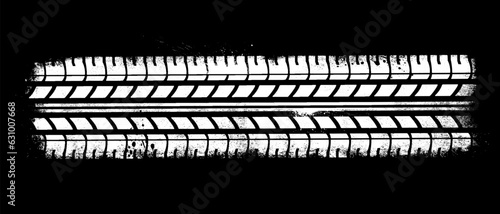 White Grunge Tire Tracks On Black Background