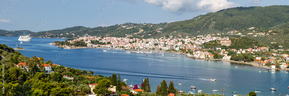Obraz premium Overview of sea bay and Skiathos town vacation at the Mediterranean Sea Aegean panorama island in Greece