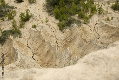 Hills of white limestone sand in the former Estonian prison of Rummu photo