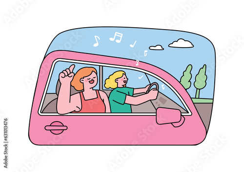 car driving holiday trip. Two friends are on a road trip, singing happily.