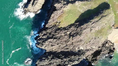 Aerial video, with drone,Tateiwa Rock Kyotango at Kyoto Japan. Birds eye spinning rising shot. photo