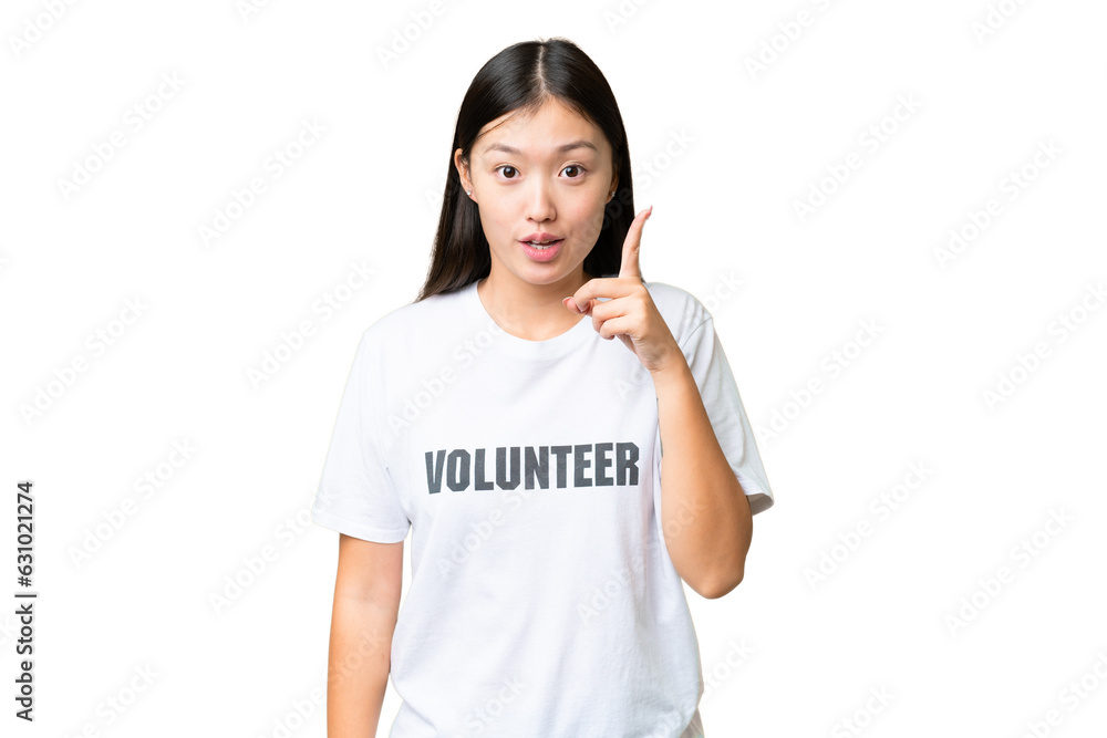 Young volunteer woman over isolated chroma key background intending to realizes the solution while lifting a finger up Young volunteer woman over isolated chroma key background intending to realizes the solution while lifting a finger up