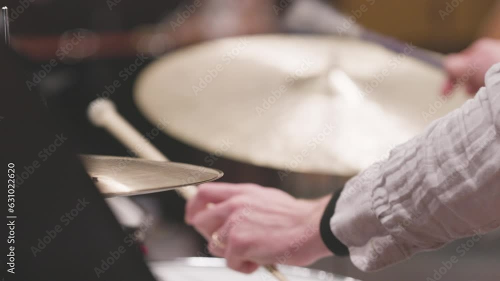 Slow motion video of a drummer playing the cymbals of their drumset with steel brush sticks. Nr.1 Slow motion video of a drummer playing the cymbals of their drumset with steel brush sticks. Nr.1