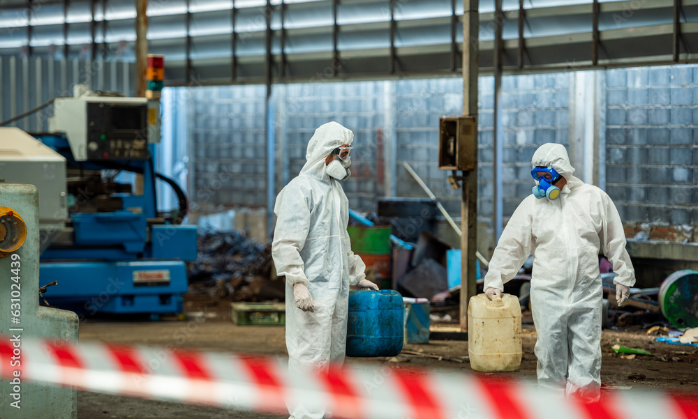 Man inspector scientist investigate chemical gas leak spill with safety face mask PPE suit in area closed barricade security red white tape. danger area infected toxic leak spill cross stripe ribbon Man inspector scientist investigate chemical gas leak spill with safety face mask PPE suit in area closed barricade security red white tape. danger area infected toxic leak spill cross stripe ribbon